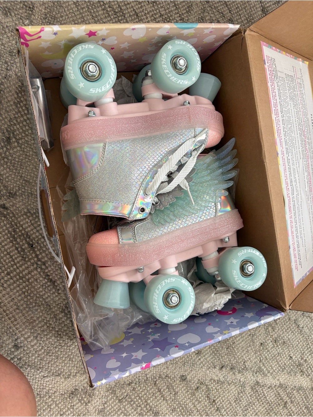 Skechers Iridescent Silver Roller Skates with Pink Soles and Mint Wheels